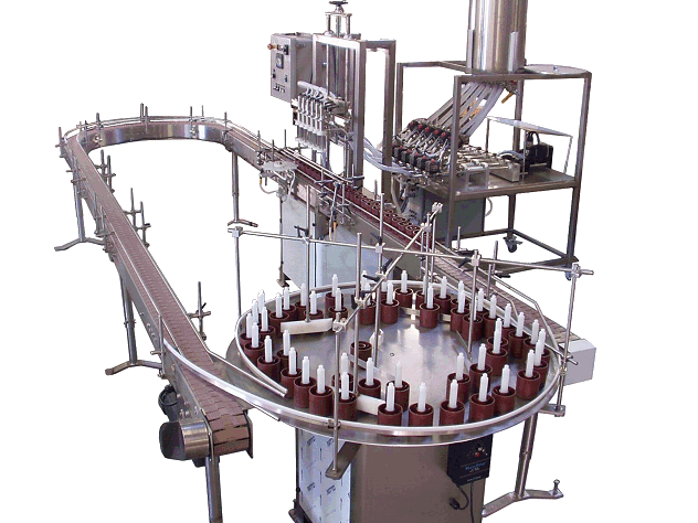 Servo Driven Straight Line Piston Liquid Filler by Packaging Dynamics, Ltd. - Manufacturer of Automatic & Semi-Automatic Liquid fillers, Conveyors, Unscramblers, Accumulators, and Custom Designed Packaging machinery & nozzles for liquids.