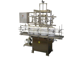 Semi-Automatic Liquid Filler by Packaging Dynamics, Ltd. - Manufacturer of Automatic & Semi-Automatic Liquid fillers, Conveyors, Unscramblers, Accumulators, and Custom Designed Packaging machinery & nozzles for liquids.